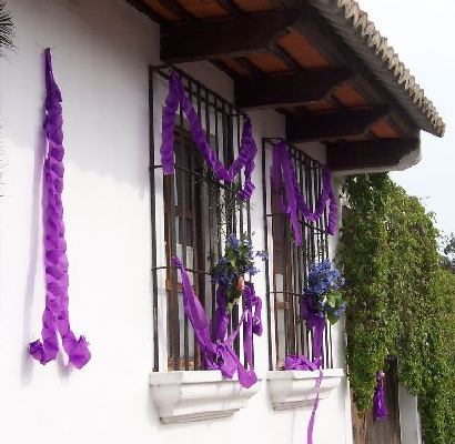 another decorated window, with purple crepe paper