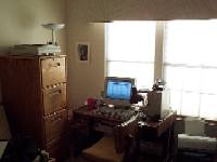 Picture of Jeffrey's study with computer and file cabinet.